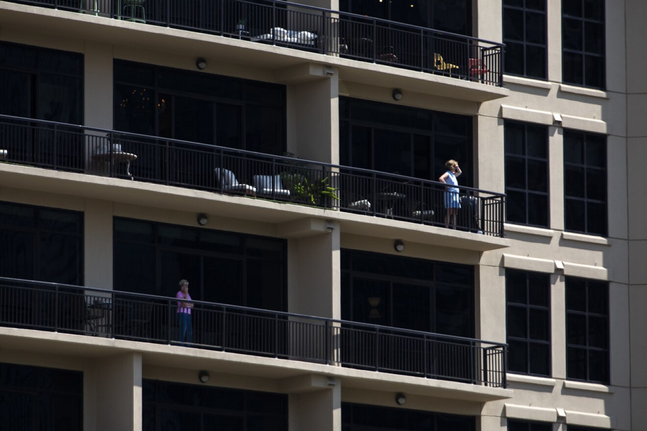 Residents in some of Austin's high rise apartment buildings wait out the stay at home order during the coronavirus pandemic.